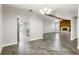 Open-concept living area showcasing seamless transitions between the kitchen, dining, and Gathering spaces at 3753 Thornbush Ln, New Port Richey, FL 34655