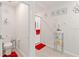 Clean, tiled bathroom with a glass-enclosed shower and modern fixtures at 39024 Harlow Rose Dr, Zephyrhills, FL 33540