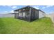 This home features a screened patio perfect for relaxing and entertaining at 39024 Harlow Rose Dr, Zephyrhills, FL 33540