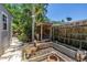 Backyard featuring a custom wood garden shed and raised garden beds at 4096 38Th S St, St Petersburg, FL 33711