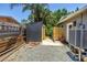 Backyard featuring a dark gray shed and gravel area at 4096 38Th S St, St Petersburg, FL 33711