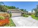 Charming home with a well-manicured lawn and long driveway at 4096 38Th S St, St Petersburg, FL 33711