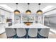 Open kitchen plan with large island featuring seating, and stainless steel appliances at 4096 38Th S St, St Petersburg, FL 33711