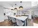 Spacious kitchen featuring an island with seating and open to the dining area at 4096 38Th S St, St Petersburg, FL 33711