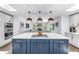 Bright, modern kitchen with stainless steel appliances and open to the living room at 4096 38Th S St, St Petersburg, FL 33711