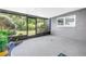 Screened patio with view of landscaped backyard at 4096 38Th S St, St Petersburg, FL 33711