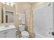 Well-maintained bathroom featuring a shower-tub combination, vanity with sink and neutral wall color at 4103 Via Piedra Cir # 10-101, Sarasota, FL 34233
