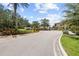 Gated community entrance with well-maintained landscaping and signage, offering a secure and welcoming entry at 4103 Via Piedra Cir # 10-101, Sarasota, FL 34233