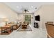 Comfortable living room with plush seating, ceiling fan, and a large TV for relaxation at 4103 Via Piedra Cir # 10-101, Sarasota, FL 34233