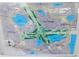 Detailed community map showcasing residential units, a golf course, and several lakes throughout the neighborhood at 4470 Mainlands W Blvd, Pinellas Park, FL 33782