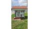 Community sign showing the Euchre on Friday, coffee on Saturday, and happy hour on Tuesday at 4470 Mainlands W Blvd, Pinellas Park, FL 33782