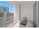 Relax on this cozy balcony with city views, featuring comfortable seating and fresh air at 449 S 12Th St # 1004, Tampa, FL 33602