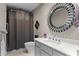 Bathroom features stylish mirror and white vanity, creating a serene and functional space at 449 S 12Th St # 1004, Tampa, FL 33602