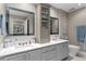 This modern bathroom offers double sinks, plenty of counter space, and a cabinet for storage at 449 S 12Th St # 1004, Tampa, FL 33602