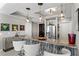 Stylish kitchen with granite countertops, stainless steel appliances, and bar seating with pendant lights at 449 S 12Th St # 1004, Tampa, FL 33602