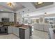 Well-appointed kitchen with modern appliances and a breakfast bar, seamlessly flowing into the living area at 449 S 12Th St # 1004, Tampa, FL 33602