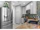 Modern kitchen featuring stainless steel appliances, granite countertops, and stylish backsplash at 449 S 12Th St # 1004, Tampa, FL 33602