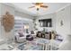 Inviting living room with large windows offering city views, a comfortable sofa, and stylish decor at 449 S 12Th St # 1004, Tampa, FL 33602