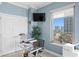 This stylish office features a computer, natural light from the window and easy access to the closet at 449 S 12Th St # 1004, Tampa, FL 33602