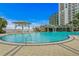 Resort-style pool features a waterfall, a bridge, and lush landscaping, creating a serene and luxurious atmosphere at 449 S 12Th St # 1004, Tampa, FL 33602
