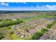 A beautiful aerial view showcases a home nestled in a well-planned community with multiple ponds at 4918 Wild Senna Blvd, Tampa, FL 33619
