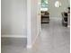Bright hallway that seamlessly connects the living area, enhancing the open floor plan at 4918 Wild Senna Blvd, Tampa, FL 33619