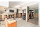 Open-concept kitchen mid-renovation with tile floors and modern appliances, ready for your personal touch at 4928 Petunia Ct, New Port Richey, FL 34652