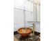 Unique bathroom vanity with a vessel sink and a stylish faucet, set against a modern countertop at 5111 Amulet Dr # 208, New Port Richey, FL 34652