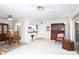 Spacious living area with dining space, an open kitchen bar, comfortable seating, and plenty of natural light at 5111 Amulet Dr # 208, New Port Richey, FL 34652