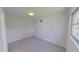 Bright bedroom with white walls and neutral carpet, offering a clean and versatile space at 5337 11Th N Ave, St Petersburg, FL 33710
