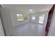 Bonus room featuring an door to the outside pool area and a window overlooking the backyard at 5337 11Th N Ave, St Petersburg, FL 33710