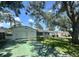 Well-maintained single-story home featuring mature trees, and a driveway at 5337 11Th N Ave, St Petersburg, FL 33710