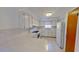 Bright kitchen featuring white cabinetry, tiled countertops, and modern appliances at 5337 11Th N Ave, St Petersburg, FL 33710