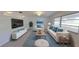 Bright living room with modern furnishings, creating a stylish and welcoming atmosphere at 5337 11Th N Ave, St Petersburg, FL 33710