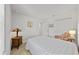 Bright bedroom featuring neutral walls and carpet, along with tasteful decor and furnishings at 5813 Grand Sonata Ave, Lutz, FL 33558