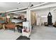 Large garage featuring sink and storage space, boat, and other equipment at 616 2Nd St, Indian Rocks Beach, FL 33785