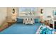 Charming main bedroom with two side tables, lamps, and decorative pillows at 616 2Nd St, Indian Rocks Beach, FL 33785