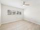 Bright, empty bedroom with natural light and a ceiling fan at 6400 Mockingbird S Way, St Petersburg, FL 33707