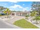 Desirable one-story home with lush landscaping and a manicured front lawn at 6400 Mockingbird S Way, St Petersburg, FL 33707
