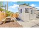 Backyard shed with a picnic table at 6400 Mockingbird S Way, St Petersburg, FL 33707