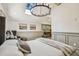 Bright bedroom with stylish decor, a skylight, and a comfortable seating area at 6401 N Central Ave, Tampa, FL 33604