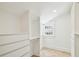 Organized walk-in closet featuring custom shelving, drawers, and ample storage space at 6401 N Central Ave, Tampa, FL 33604