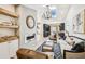 Stylish living room with hardwood floors, a fireplace, and an open floor plan into the kitchen at 6401 N Central Ave, Tampa, FL 33604