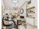Stylish living room with hardwood floors, a fireplace, and an open floor plan into the kitchen at 6401 N Central Ave, Tampa, FL 33604