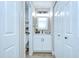 Clean and bright bathroom featuring a white vanity, modern lighting, and neutral tones at 6720 Gilda Dr, Tampa, FL 33625