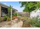 Private outdoor backyard seating area amid lush, natural landscaping at 7631 Ironbark Dr, Port Richey, FL 34668