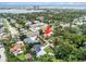 Aerial view of property's location showcasing lush greenery, proximity to bay, and neighborhood at 7802 134Th St, Seminole, FL 33776