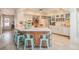 Spacious kitchen island features a breakfast bar and modern design at 7802 134Th St, Seminole, FL 33776