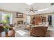 Inviting living room with brick fireplace, skylights, comfortable seating, and stylish decor at 7802 134Th St, Seminole, FL 33776