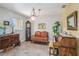 Cozy living room featuring natural light, tiled floor, and traditional furnishings at 7802 134Th St, Seminole, FL 33776